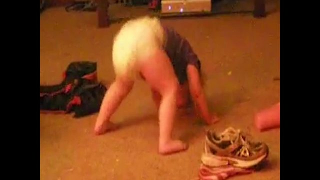 "Toddler Girl Dancing In Diaper"