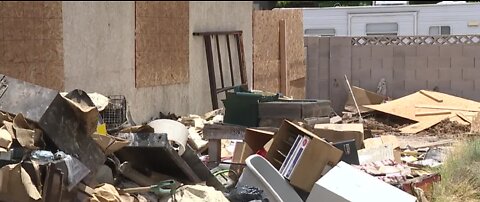 UPDATE: Walls of trash made deadly fire difficult for firefighters to battle