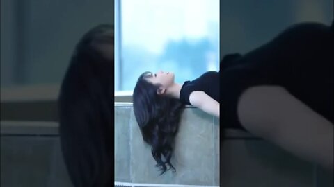 Hot Chinese Girl Lying On Concert Wall Looking Fabulous.