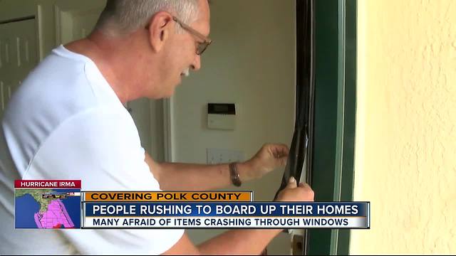 Polk residents rushing to board up their homes