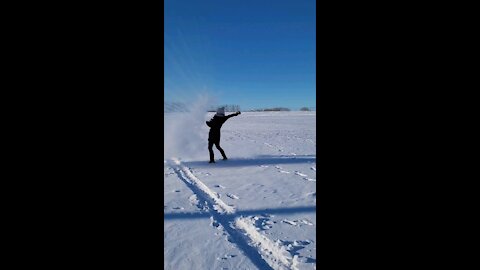 Boiling hot water freezes instantly into white powder