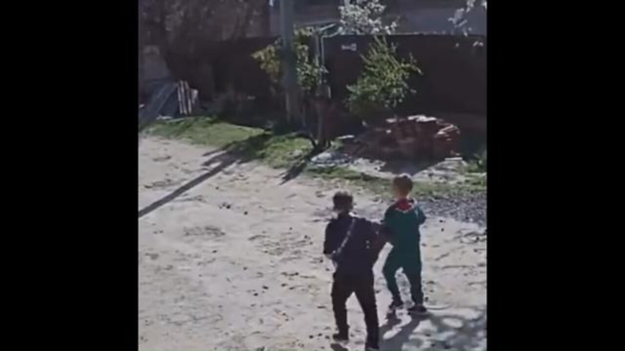 Mikolayiv (still Ukraine): Kids playing with an anti-tank weapon almost killing themselves