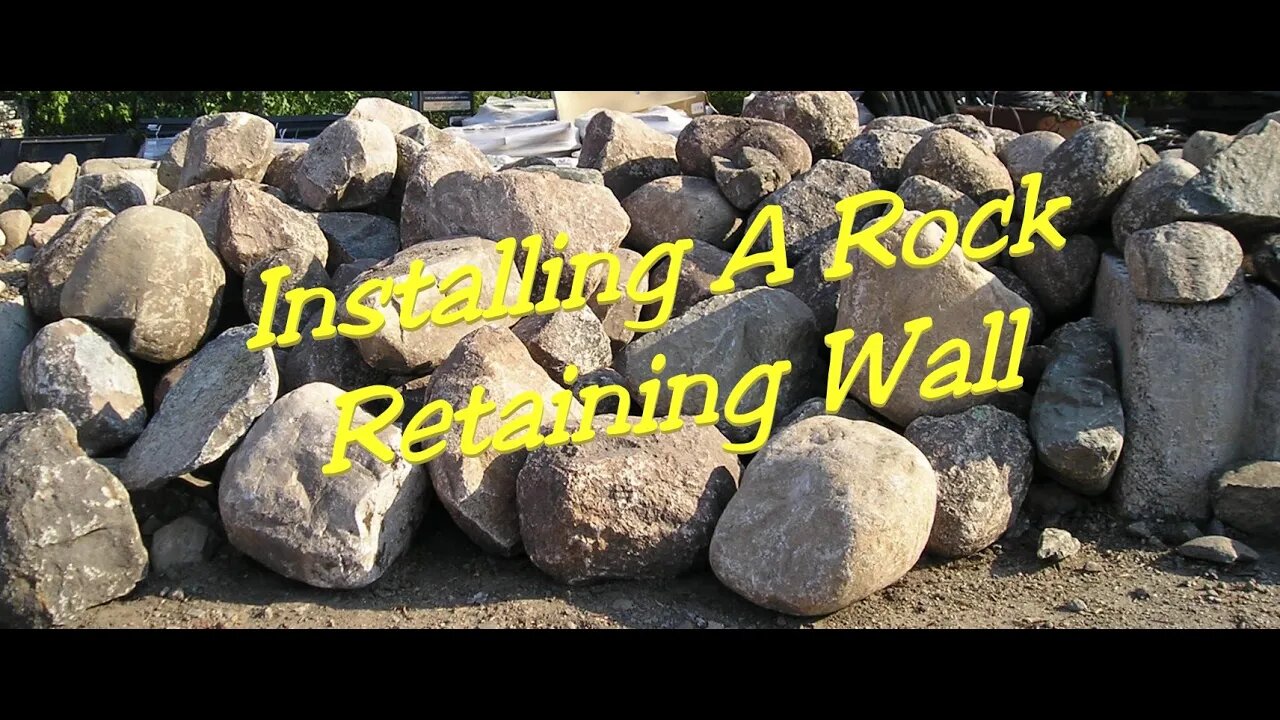 Installing a rock retaining wall