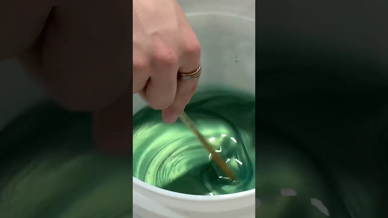 Pouring epoxy for our epoxy with burl chess board