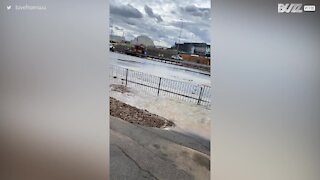 Burst pipe floods London highway