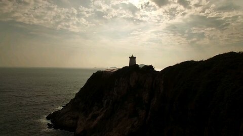 birds chirping sound and sunlight near lighthouse