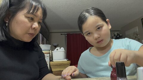 Mom and daughters bonding.