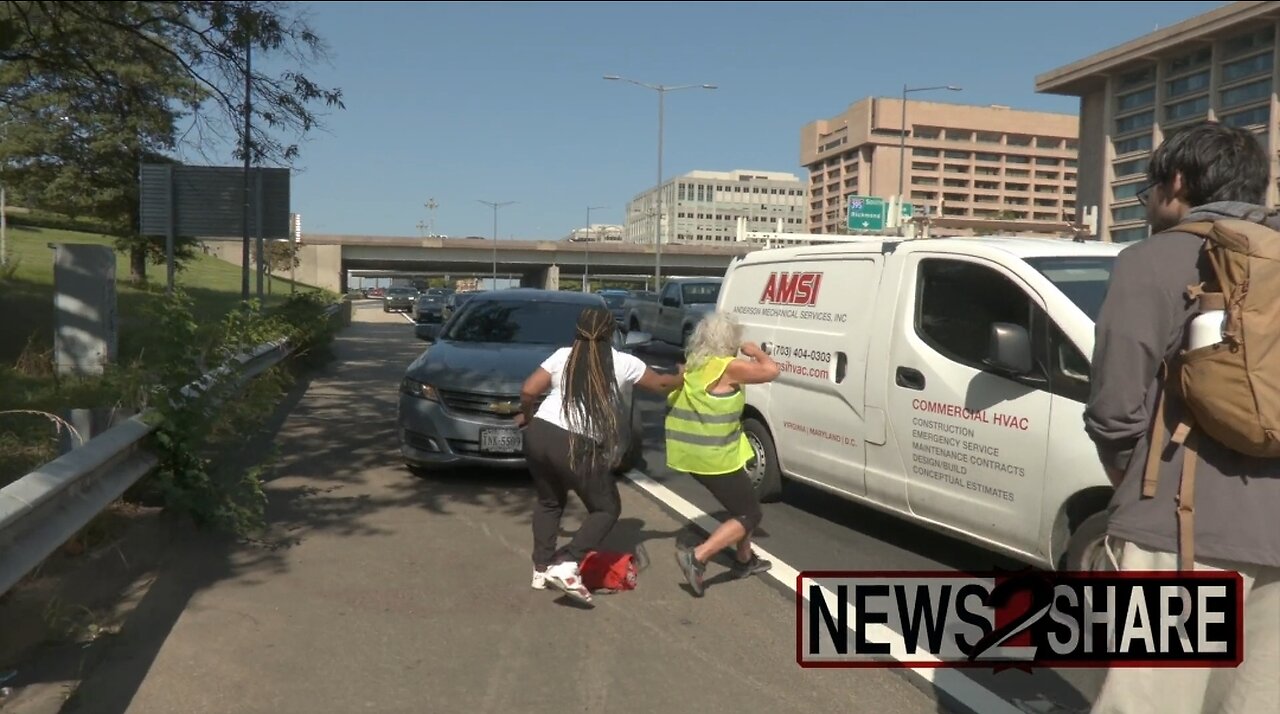 Woman in DC Shows How To Handle Climate Crazies Blocking Traffic