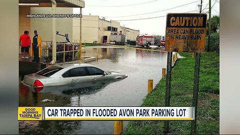 CAUTION: Area can flood in heavy rain; staying safe on flooded roads