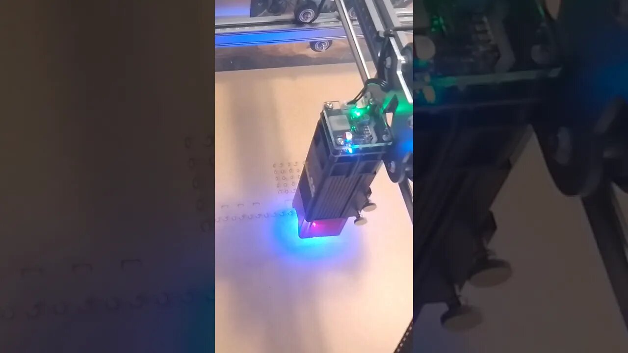 Cutting wood patterns with laser.