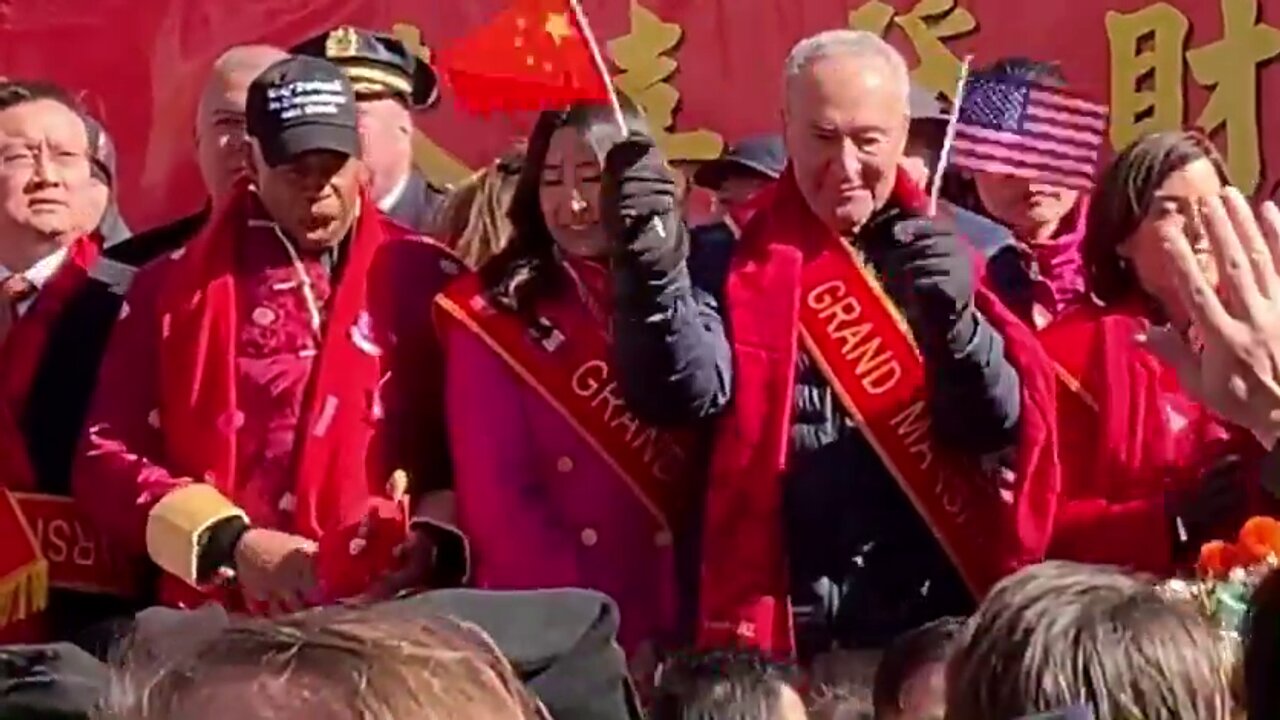 Senator Chuck Schumer waved the People's Republic of China flag onstage at a Lunar New Year event