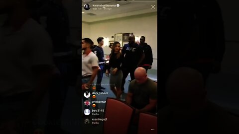 Derrick Lewis checking out Michelle Waterson