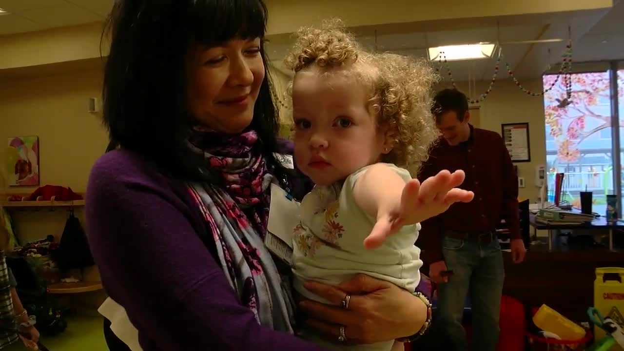 Veterinary dogs bring holiday cheer to long-term pediatric patients