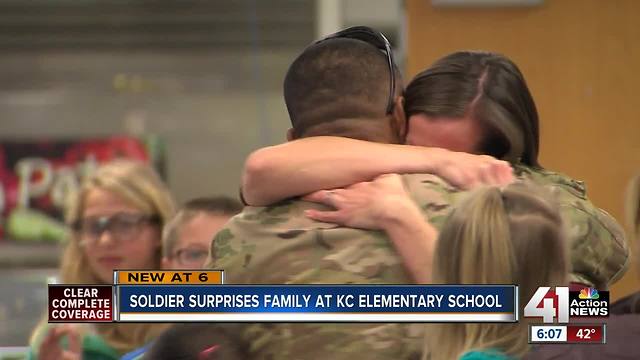 Military dad surprises wife, kids at KC school