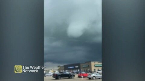 Time-lapse: Small funnel spins from the clouds