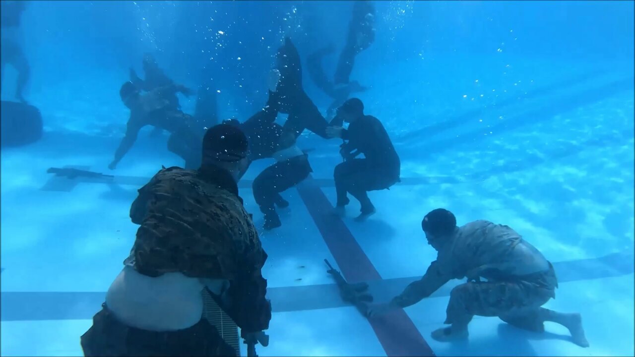 Marines with 5th ANGLICO participate in a Water Survival Advanced course on Camp Hansen, Okinawa