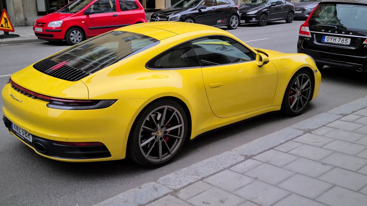 Yellow Porsche 911 Carrera S 992 generation [8k]