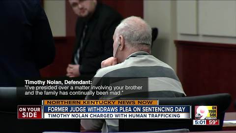 Former judge withdraws guilty plea to human trafficking charge