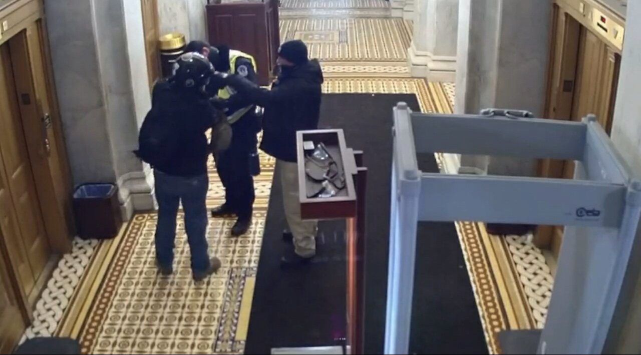A protester from Jan. 6 is released and fist pumps his buddy, was he a cop or FBI?