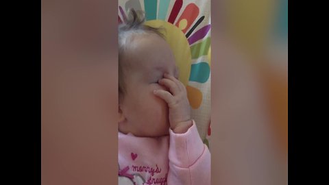 Baby Discovers her Hands!