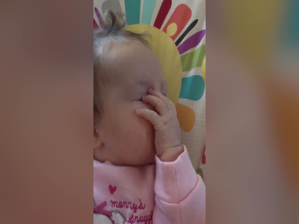 Baby Discovers her Hands!