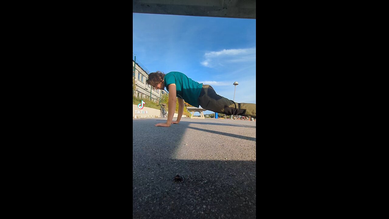 Doing spiderman pushups Doing spiderman pushups