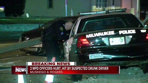 Two Milwaukee Police officers hurt after suspected drunk driver strikes squad car