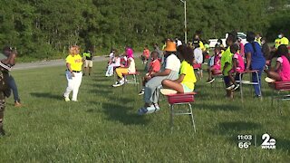 112 red desks for the children who were killed in Baltimore