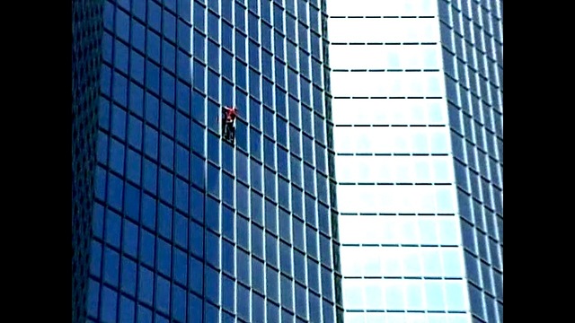 French Spiderman Climbs Totalfina Skyscraper