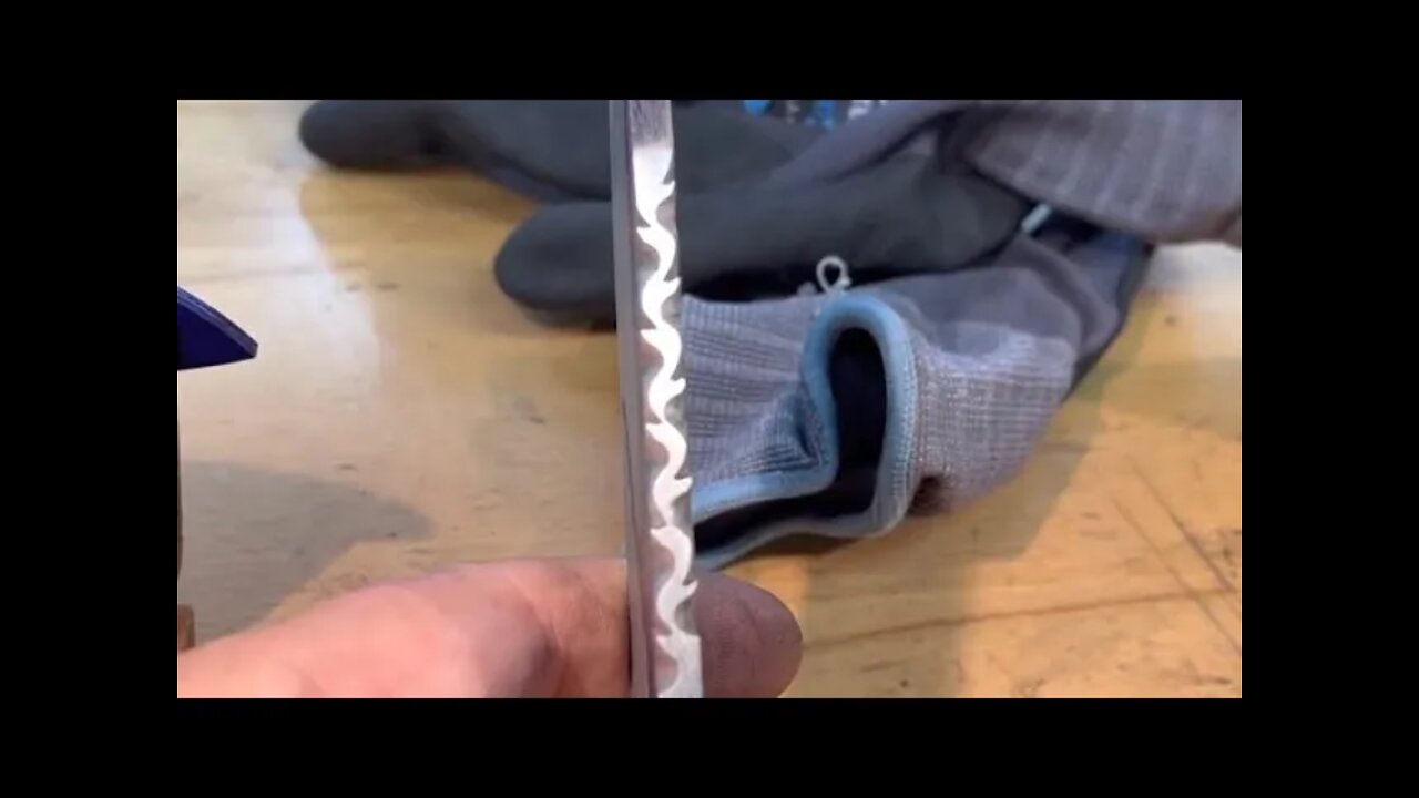 Knife spine scroll work