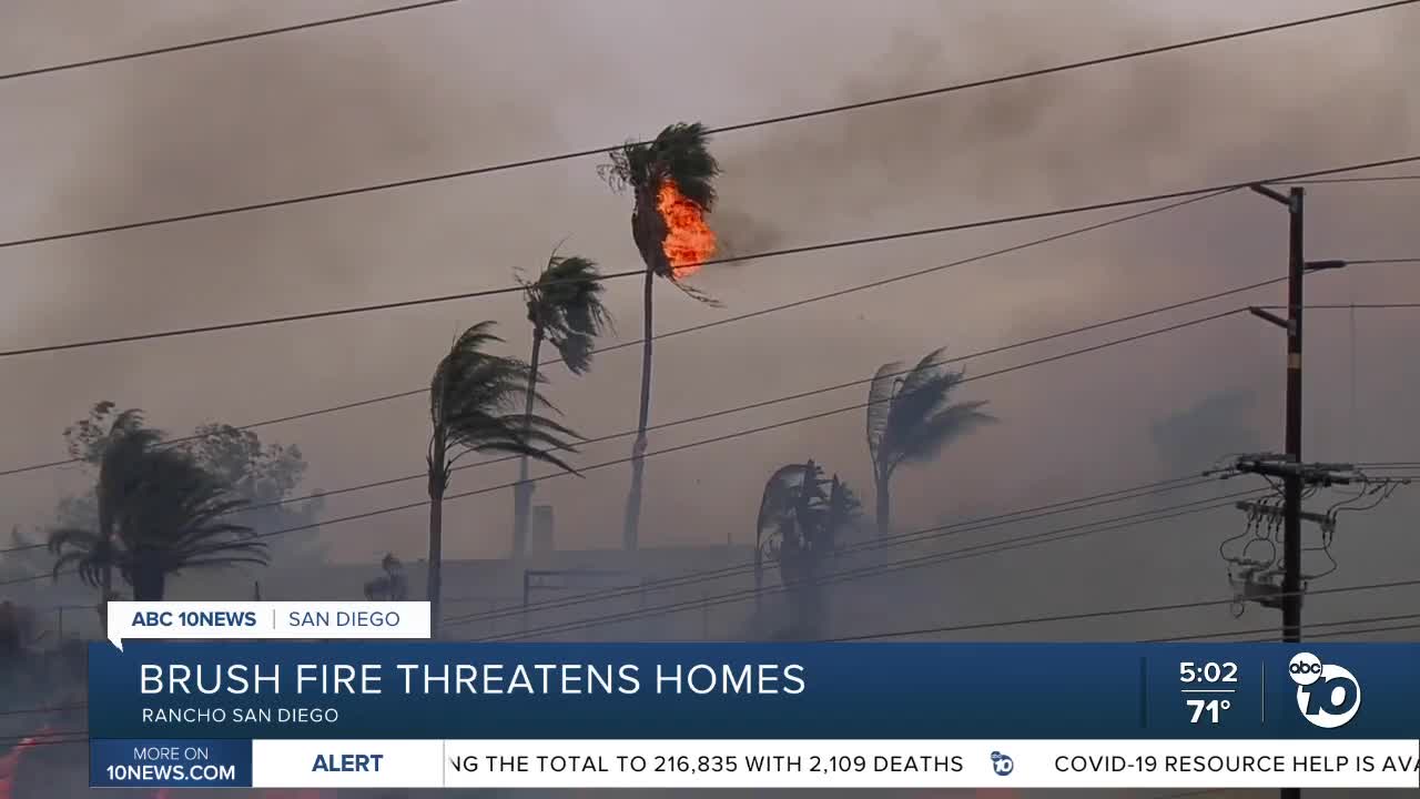 Two brush fires erupt in San Diego County and threaten homes
