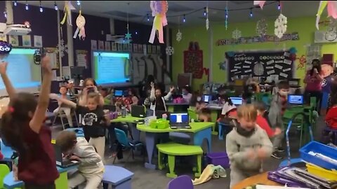 Children is reaction to being told they no longer have to wear masks at a school in Las Vegas