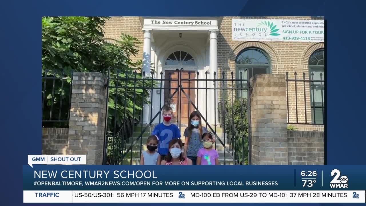 New Century School in Fells Point says "We're Open Baltimore!"