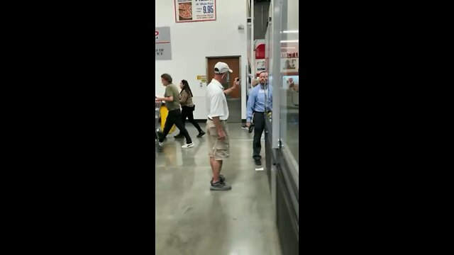 Masker threatens Costco workers