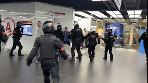 Paris police beat woman who tried to go shopping at the mall without a vaccine passport.