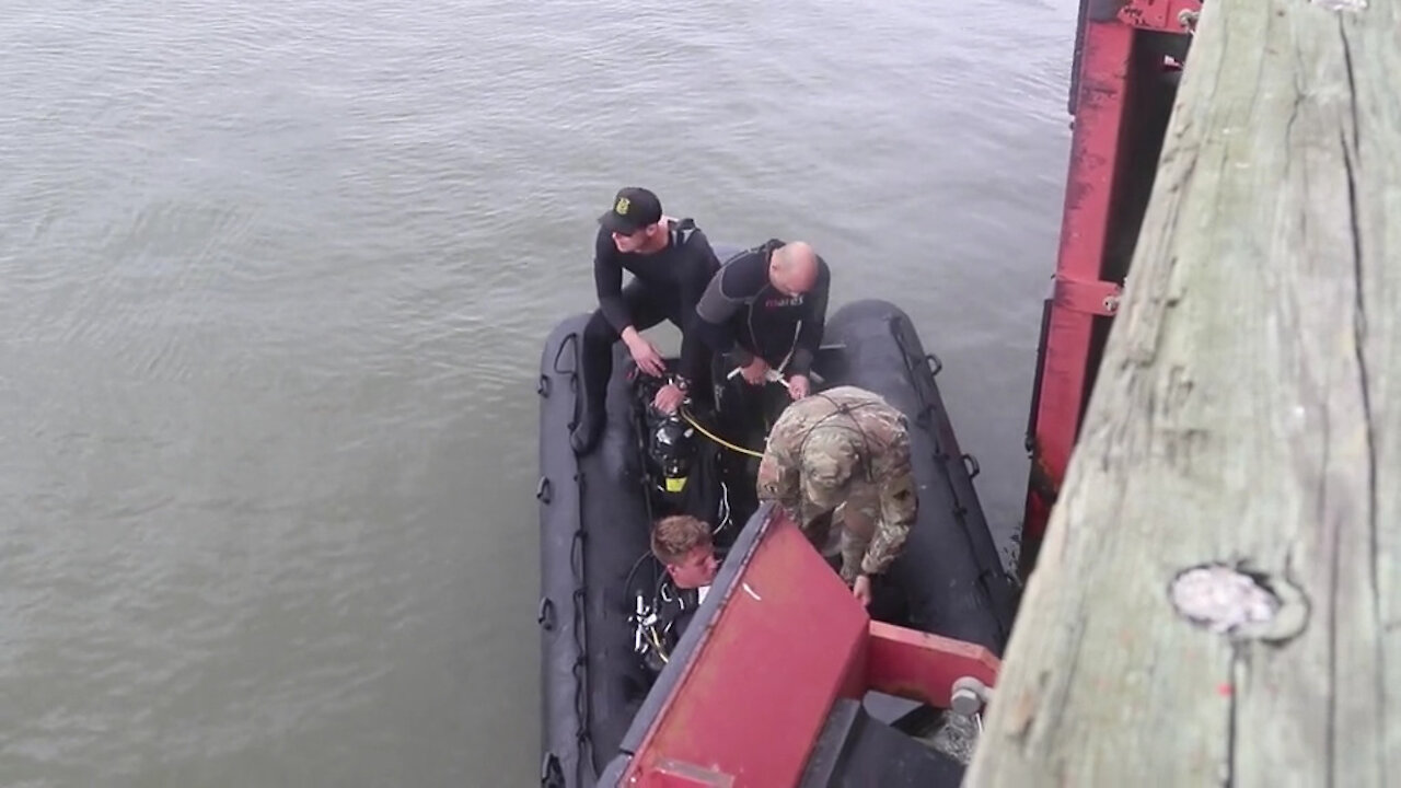 Army divers survey harbor of Port Arthur