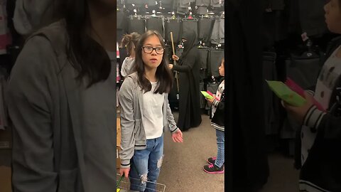 School is about to come -mommy is choosing new cloths for her girls