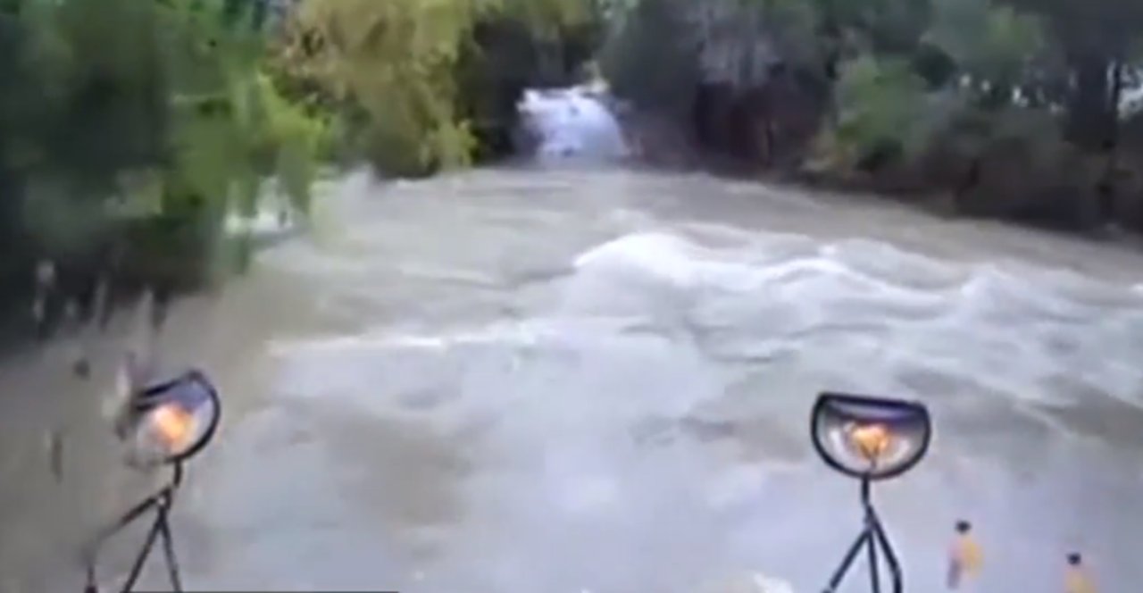 School bus swept away by floodwaters in Texas