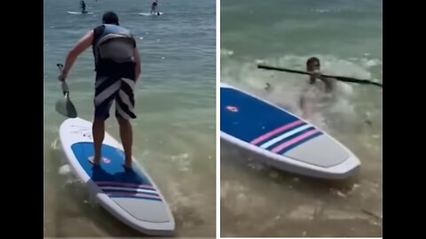 Man Falls Trying to Paddleboard Fail