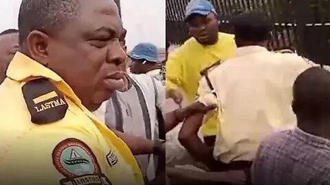 The moment two LASTMA officers fled into a bank to escape being lunched after causing an accident.