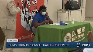 Dunbar High student signs as Gators prospect