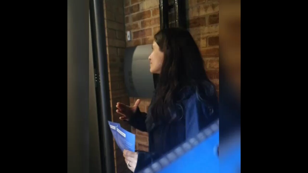 teacher goes door to door explaining the dangers of vaccinating children against covid