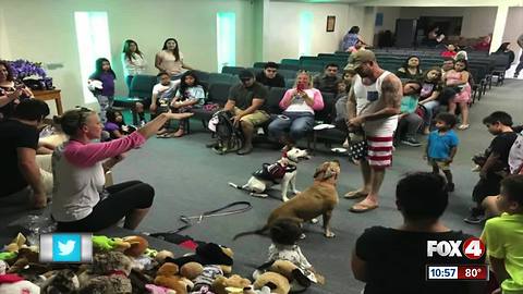 Abigail and therapy dog sister bring toys to kids in Immokalee after Irma