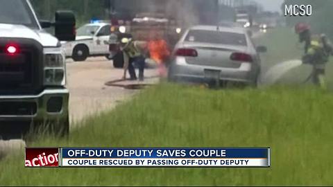 Off-duty deputy saves couple in burning car