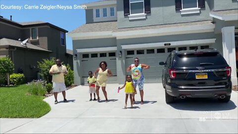 Land O' Lakes neighborhood dance in their driveways to make social distancing music video