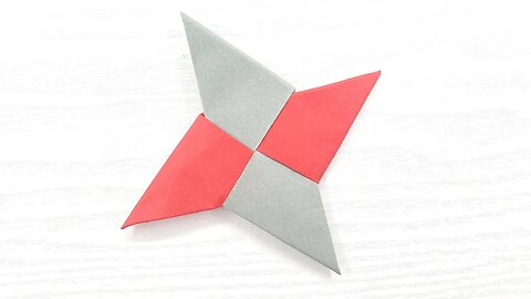 Origami paper ninja star shuriken with Ski