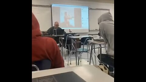 Teacher caught looking at nudes during class