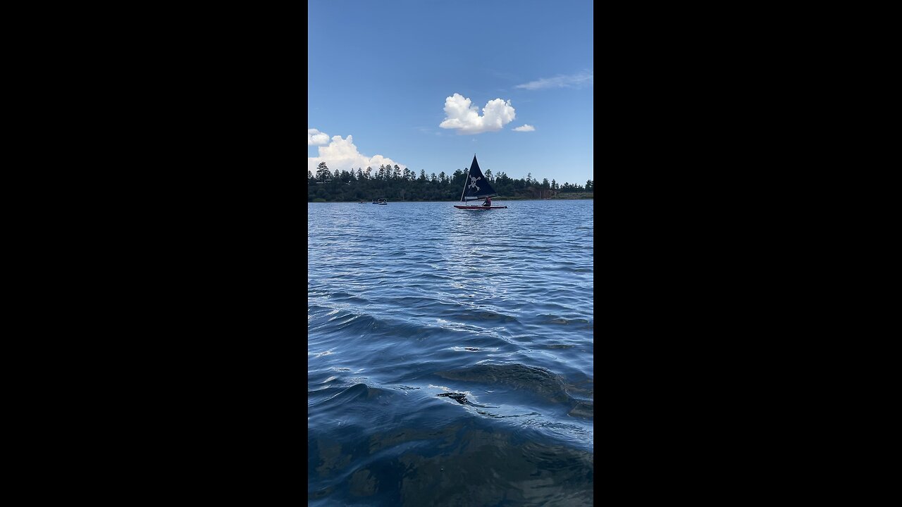 Sunfish sailing on Lynx Lake