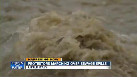 Protestors marching over sewage spills