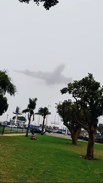 Plane appearing out of the fog